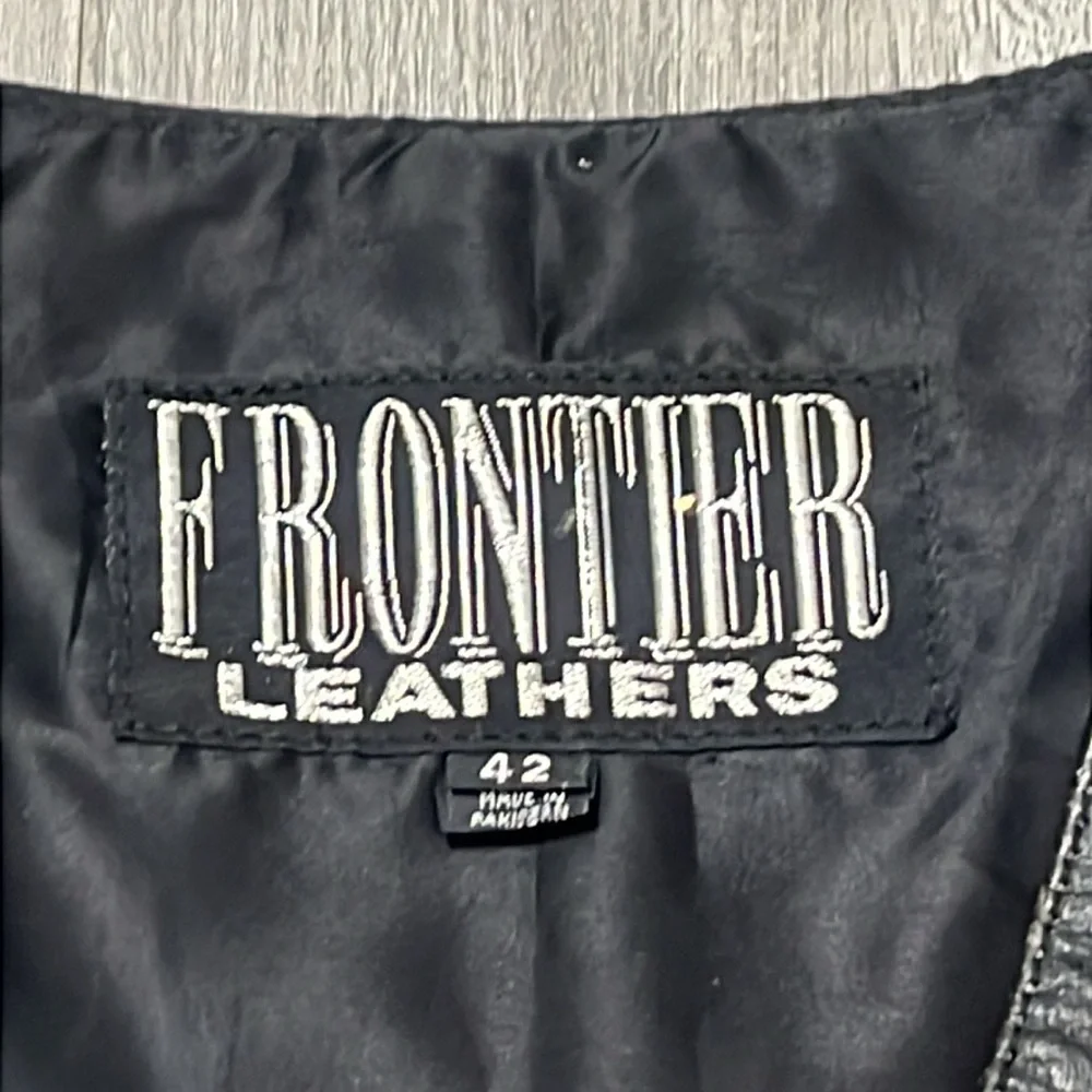 Frontier Leather Men’s Vest w/ the “Harley Davidson” patch on the back. Size 42